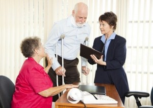 Couple meeting with attorney.