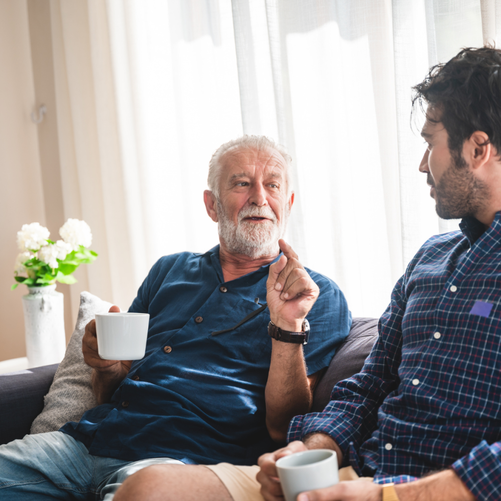 Son helping aging parent.