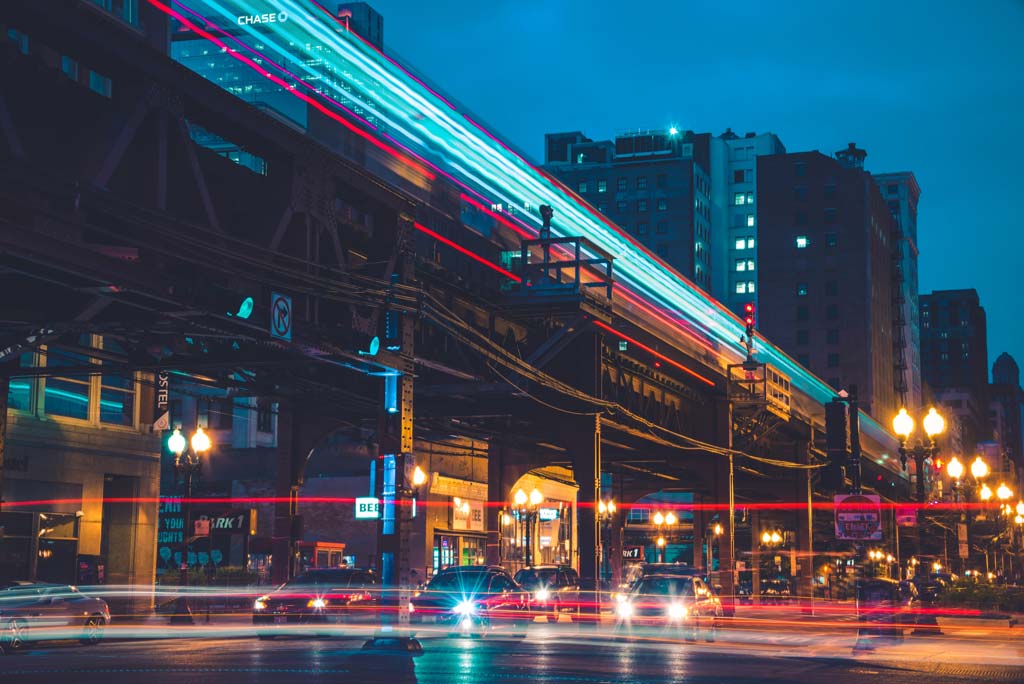 Downtown L trains whizzing in th evening.