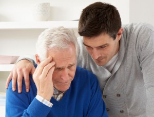 Son helping aging parent.