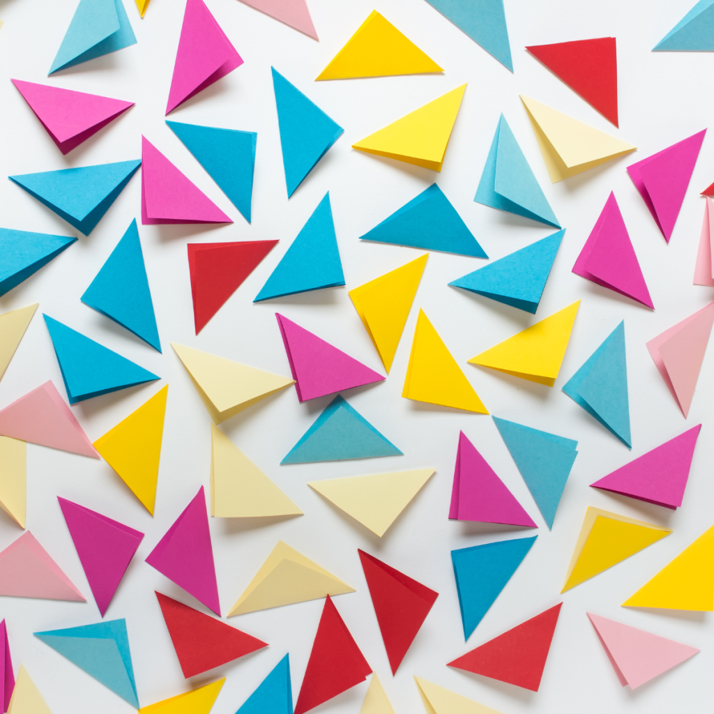 Multi-colored triangle shapes arranged on a light background.