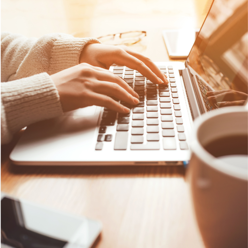 Woman working on her laptop at home.