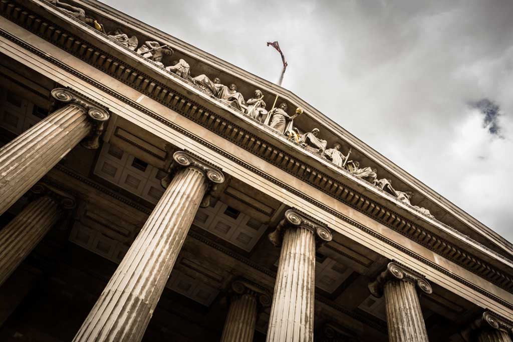 Building in classical architecture style with doric columns.