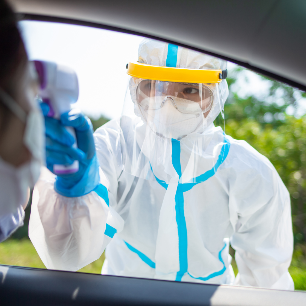 Checking the temperature of a person in a vehicle.