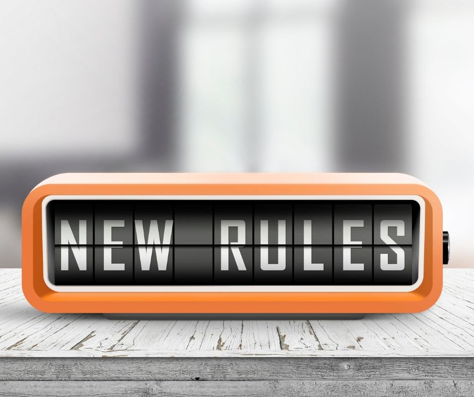 Clock with words saying New Rules